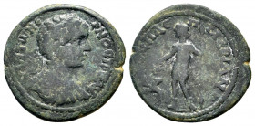 LYDIA.Silandus. Caracalla. (198-217).Ae.Helenus, magistrate. Laureate, draped, and cuirassed bust right / Dionysus standing left, holding cantharus an...