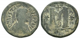 JUSTIN I. 518-527 AD.Constantinople mint.AE Follis.DN IVSTINVS PP AVG, pearl diademed, draped, cuirassed bust right / Large M, star left, cross above,...