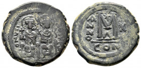 JUSTIN II and SOPHIA.565-578 AD.Constantinople mint.AE Follis. DN IVSTINVS PP AVG, Justin on left holding cross on globe and Sophia on right, holding ...