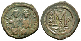 JUSTIN II and SOPHIA.565-578 AD.Constantinople mint.AE Follis.DN IVSTINVS PP AVG, Justin and Sophia enthroned facing, holding between them globus cruc...