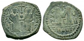 JUSTIN II and SOPHIA.565-578 AD.Antioch mint.AE Follis.DN IVSTINVS PP AVG, Justin and Sophia enthroned facing, holding between them globus cruciger / ...