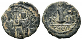 JUSTIN II with SOPHIA.565-578 AD.Theoupolis (Antioch).AE Decanummium.Justin and Sophia seated facing on double throne, each holding scepter and globus...