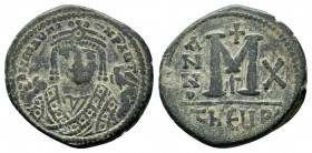 MAURICE TIBERIUS. 582-602 AD. Antioch mint.AE Follis. DN MAVΓI CN P AUT, crowned bust facing, wearing consular robes; holding mappa and eagle-tipped s...