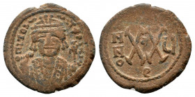 MAURICE TIBERIUS.582-602 AD.Antioch mint. AE Decanummium.D N MAVRI CN P AVT, helmeted and cuirassed bust facing, holding mappa and eagle-tipped scepte...