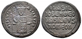 BASIL I. 867-886 AD.Constantinople mint.AE Follis.bASILIOS bASILEVS, star, emperor, crowned and wearing loros, seated facing on lyre-backed throne wit...