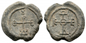 BYZANTINE LEAD SEAL.Circa 11 th Century.PB Seal.Circa 5 th-6th Century.PB Seal.In the name of Illustrious Patrikios.In cruciform monogram within borde...