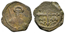 CRUSADERS. Antioch. Tancred. (1101-1112). Ae. Follis.
 
Obv: KΕ ΒΟ TANKPI Cuirassed bust of Tancred facing, wearing turban with cross and holding swor...