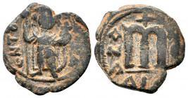 UMAYYAD CALIPHATE.Pseudo Byzantine Type.Imitating the Types of Constans II.Circa 647-670 AD.AE Fals.Emperor standing facing, holding long cross and gl...