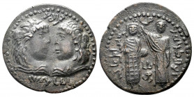 ARTUQID of MARDIN.Najim al-Din Alpi.1152-1176 AD.No Mint.558 AD.AE Dirhem.Confronted draped male busts / Byzantine emperor standing facing, being crow...