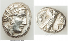 ATTICA. Athens. Ca. 393-294 BC. AR tetradrachm (23mm, 16.88 gm, 7h). Choice AU, scratch. Late mass coinage issue. Head of Athena with eye in true prof...