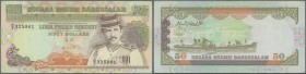 Brunei: 50 Ringgit P. 16 used but with error print, missing signature titles and signatures at center, rare error, condition: F to F+.
