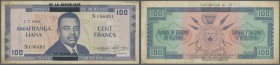 Burundi: 100 Francs 1966 P. 17, with black overprint, one light center fold, handling and light stain in paper, especially at borders, corner fold at ...