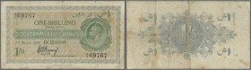 Cyprus: 1 Shilling 1920, P.14, highly rare note and one of the key-notes from Cyprus with several folds, slightly stained paper and a number of tears ...