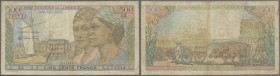 French Equatorial Africa: 500 Francs ND P. 25, used with stained paper and folds, no holes or tears, condition: F-.