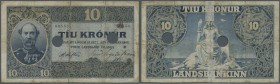 Iceland: 10 Kroner L.1885 (1900) P. 5b, torn an taped on back side, 2 cancellation holes, stained paper, folds, still stongness in paper and nice colo...