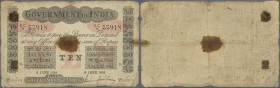 India: Government of India 10 Rupees 1912 LAHORE issue P. A10, stronger used with large stain dots in paper, several folds, borders worn, stained pape...