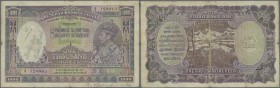 India: 1000 Rupees ND(1937) P. 21d KARACHI issue, used with vertical and horizontal folds, larger center hole, border tears but still strongness in pa...