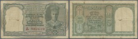 India: 5 Rupees ND P. 23 portrait KGVI with rare Red serial number, used with hole at left, folds and stain in paper, condition: F.