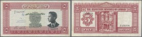 Jordan: 5 Dinars L.1949 P. 7b, used with several folds and creases, a pen writing at left on front, no holes, no tears, not washed or pressed, still c...