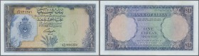 Libya: 1 Pound 1963 P. 25, no holes or tears, crisp paper and original colors, not washed or pressed, one light vertical fold and one corner fold, con...