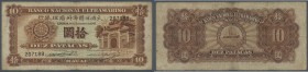 Macau: 10 Patacas 1945 P. 30, seldom seen note in nice condition, used from circulation wiht folds and stain in paper but without holes, no repairs, j...