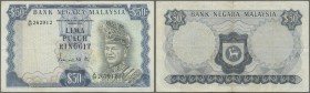Malaysia: Bank Negara Malaysia 50 Ringgit ND(1976-81), P.16, still nice and attractive note with a few folds and lightly toned paper. Condition: F+