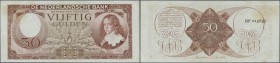 Netherlands: 50 Gulden 1945, P.78, rare note in nice condition with a few folds and creases, stained paper at upper left. Condition: F+