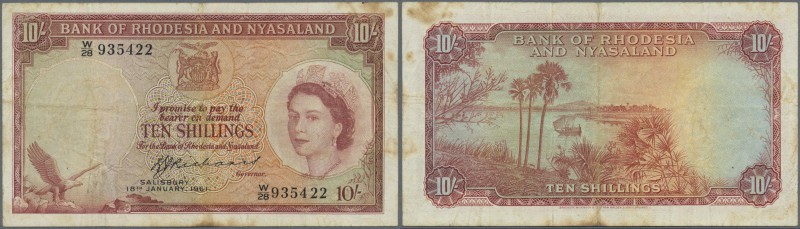 Rhodesia & Nyasaland: 10 Shillings 1961 P. 20, used with folds and stain in pape...