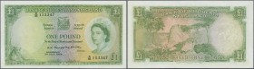 Rhodesia & Nyasaland: 1 Pound 1959, early date, P. 21b in nice condition, no visible folds but pressed, still strong paper with crispness and original...