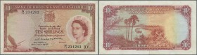 Rhodesia & Nyasaland: 10 Shillings 1958 P. 20b, light folds in paper but no holes or tears, not washed or presed, strong paper and original colors, co...