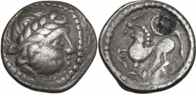 Celtic World. Celtic, Danubian Region. The Skordoski. AR Drachm,3rd-2nd century BC. Obv. Laureate head of Zeus right. Rev. Horse left; above, wheel. L...