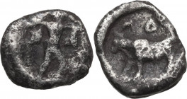 Greek Italy. Northern Lucania, Posidonia. AR Hemiobol, c. 445-420 BC. Obv. Poseidon standing right, preparing to cast trident. Rev. Bull standing left...