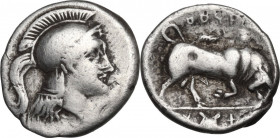 Greek Italy. Southern Lucania, Thurium. AR Triobol, c. 350-300 BC. Obv. Head of Athena right, wearing crested Attic plain helmet. Rev. ΘOYPIΩN. Bull b...