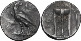 Greek Italy. Bruttium, Kroton. AR Nomos, c. 280-277 BC. Obv. Eagle standing left on thunderbolt, head turned right; Φ-I on either side of head. Rev. K...