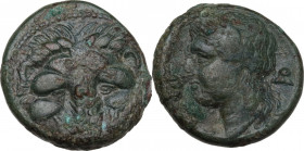 Greek Italy. Bruttium, Rhegion. AE 20. 5 mm, c. 351-280 BC. Obv. Lion’s mask facing. Rev. Head of Apollo left, laureate; behind, symbol. HN Italy 2534...