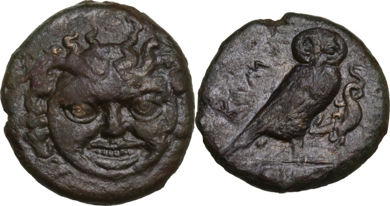 Sicily. Kamarina. AE Tetras or Trionkion, c. 420-405 BC. Obv. Gorgoneion facing....