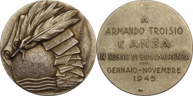 ANSA. Medaglia 1945 in segno di benemerenza ad Armando Troisio. AG dorato. 40.00 mm. Opus: B. Locatelli. qSPL.
