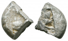 Archaic. Circa 525-475 BC. Cut AR Fragment

Condition: Very Fine

Weight: 5.2 gr
Diameter: 13 mm