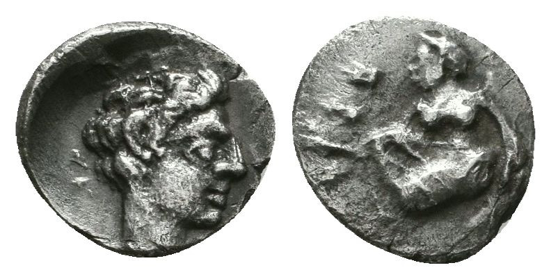 CILICIA, Tarsos. Circa 370 BC. AR Obol. Female kneeling left, casting astragaloi...