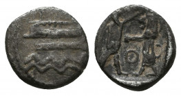 Sidon. Uncertain king (ca. 450-435 BC). AR. Phoenician galley sailing left before city walls with four towers; in exergue, two lions / Persian king st...