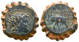 Seleukid Kingdom. Uncertain mint. Antiochos VI Dionysos 144-142 BC. Serrate Æ . Radiate head of Antiochus right, wreathed with ivy / BAΣIΛEΩΣ ANTIOXOY...