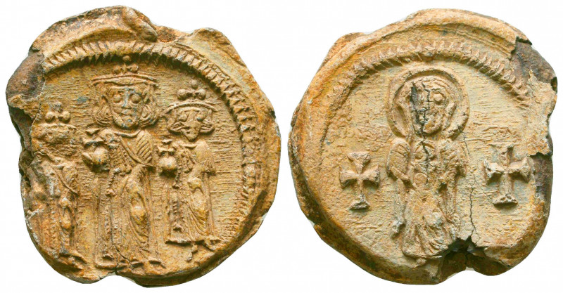 Herakleios, Herakleios Constantine and Heraklonas lead seal
(638-641).

Obverse:...