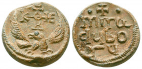 Bilingual byzantine lead seal of Miraduboru
(6th cent.)
Obverse: Eagle with open wings to left, invocative cruciform monogram over its head resolved a...
