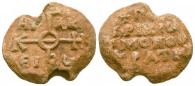 Byzantine lead seal of 
Herakleios patrikios and monostrategos
(8th cent.)
Obverse: : Invocative cruciform monogram inscribed in the corners, resolved...