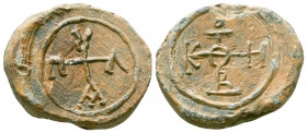 Byzantine lead seal of Paul officer
(7th cent.)

Obverse: : Invocative cruciform monogram, resolved as, ΘΕΟΤΟΚΕ ΒΟΗΘΕΙ (Mother of God, help), wreath b...