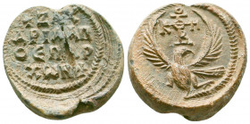 Byzantine lead seal of Zacharias honorary eparch
(7th cent.)
Obverse: Eagle with open wings to right, invocative cruciform monogram over its head reso...