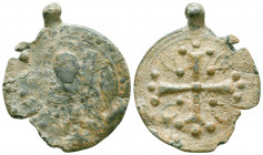 A byzantine Christian lead pendant amulet
(ca 6th-7th cent.)
 
Obverse: A large cross in the centre, three pellets at the end of each arm, a pellet in...