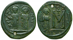 Justin II, 565-578. AE 8 Pentanummis (= Follis).herson. XEP-CONOC. Emperor and Empress Sophia, both nimbate, stg. facing on dais, holding gl. cr. and ...