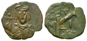 CONSTANTINE IV. 668-685 AD. Æ Half Follis. Syracuse mint. 
Reference:
Condition: Very Fine

Weight: 3.6 gr
Diameter: 21 mm