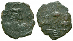 Constans II, with Constantine IV, Heraclius, and Tiberius. 658-669. AE follis. Constantinople mint. 
Reference:SBCV 1013 or 1014; DOC 88 or 89
Conditi...